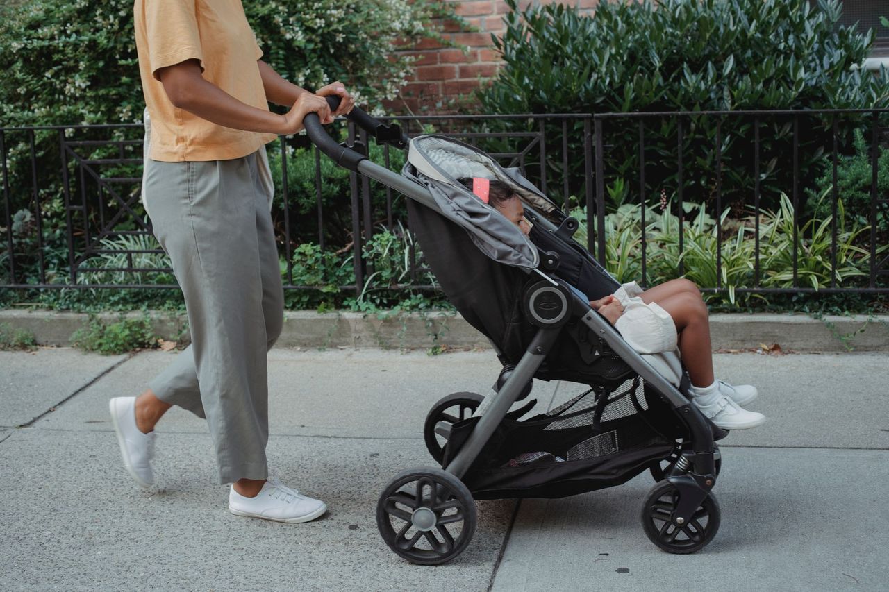 mother toddler airport walking