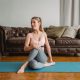 Woman in athleisure doing yoga at home